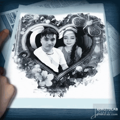 a picture of a man and woman in a heart shaped frame