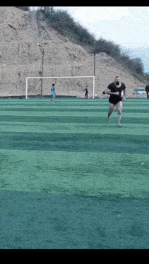 a man wearing a mask is running on a field