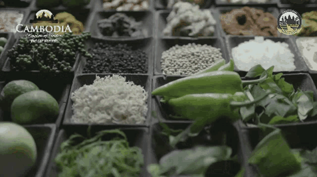 a variety of vegetables and spices with cambodia written on the bottom right