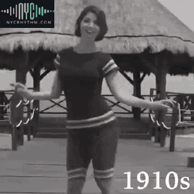 a woman is dancing in a black and white photo with the year 1910s