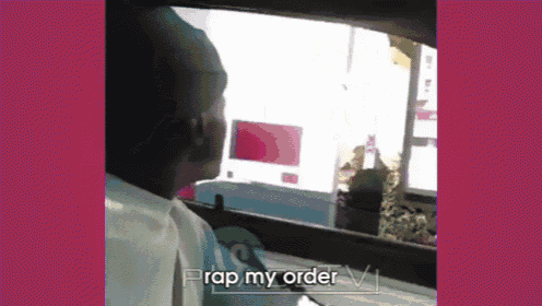 a man in a car is looking out the window and says " prap my order " at the bottom