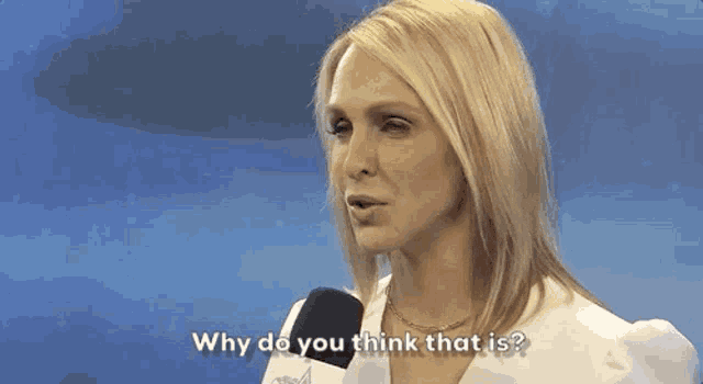 a woman is talking into a microphone and says why do you think that is ?