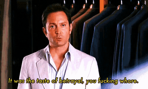 a man in a white suit says it was the taste of betrayal you fucking whore .
