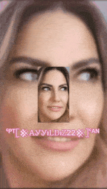 a close up of a woman 's face with the words ayyildiz22 fan written below it