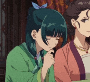 two anime girls are standing next to each other and one has a bow in her hair .