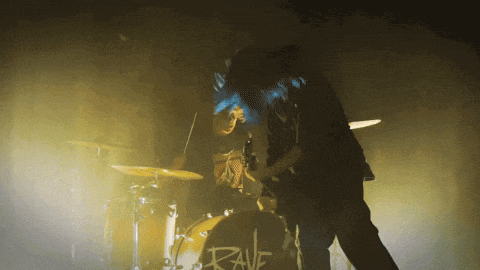 a drum set with the word rave on the front