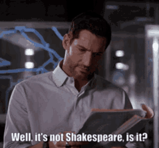 a man is reading a book and says well it 's not shakespeare is it .