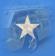 a silver car with a yellow star on it