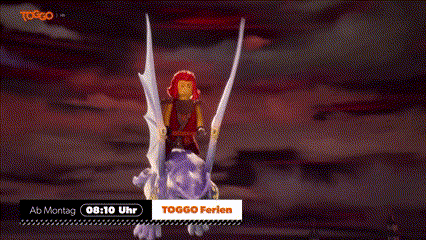 a lego figure is flying through the air with a toggo logo in the background