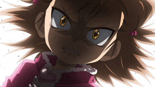 a close up of a girl 's face with an angry look on her face