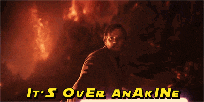 a man holding a lightsaber with the words " it 's over anakine " below him