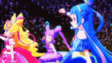 a group of three anime girls are dancing together
