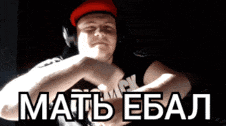 a man in a red hat is making a heart shape with his hands and the words matb ebal in white letters behind him