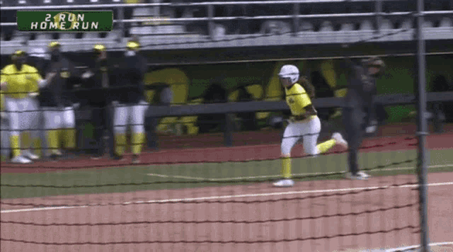 a baseball game is underway and the score is 2 to 1 home run