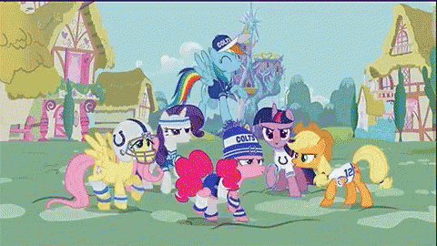 a group of ponies wearing colts hats and jerseys