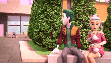 a boy and a girl are sitting next to each other and the boy has the number 2 on his shirt