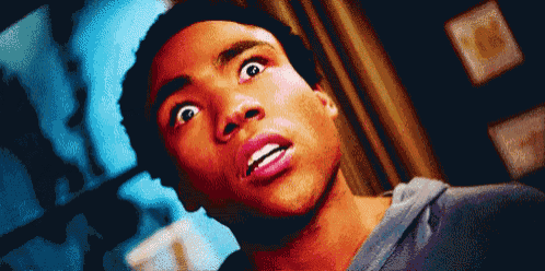 a pixelated image of a man with his mouth open