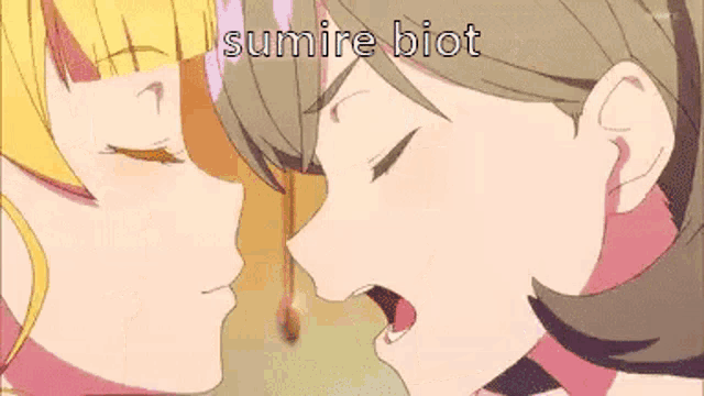 a couple of anime girls are kissing each other in a scene from an anime .