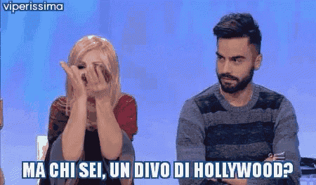 a man and a woman are sitting next to each other and the man says ma chi sei un divo di hollywood ?
