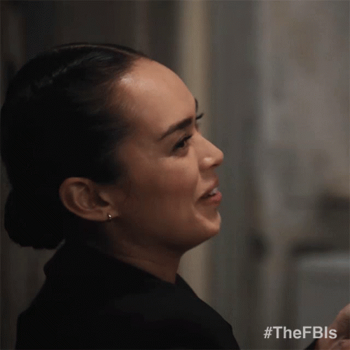 Laughing Special Agent Cameron Vo GIF - Laughing Special Agent Cameron Vo Fbi International GIFs