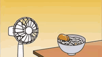 a cartoon of a fan next to a bowl of food