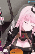 a pink haired anime girl is sitting in a chair with her eyes closed and holding a hamburger .