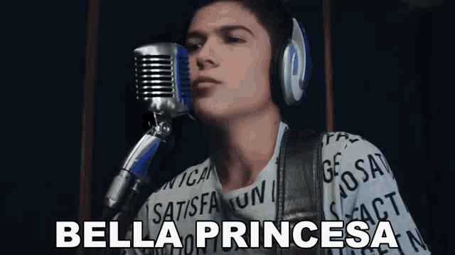 a young man singing into a microphone with the words bella princesa written below him