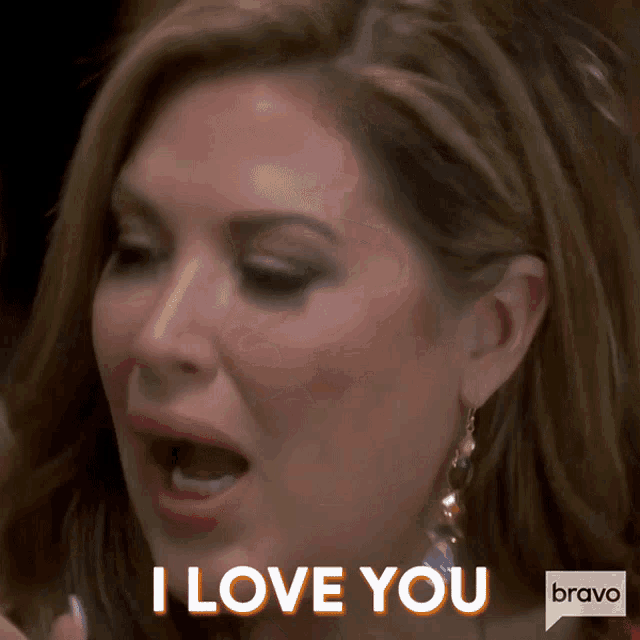 a close up of a woman 's face with the words i love you on the bottom