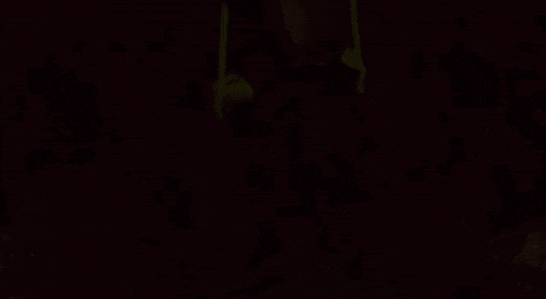 a scarecrow with a pumpkin head is holding an axe