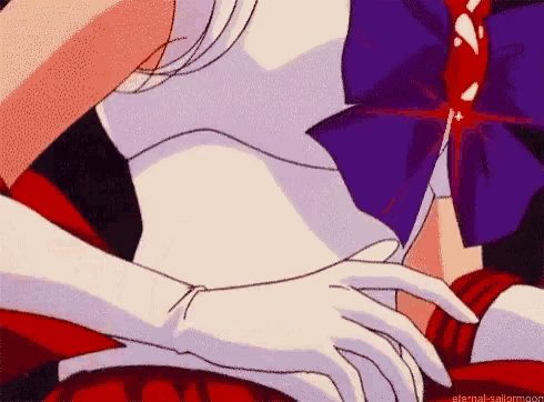 a close up of a person 's stomach with a glove on .