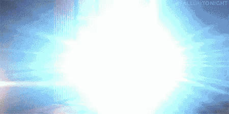 a blurred image of a blue light coming out of a building