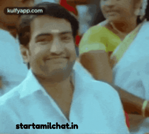 a man in a white shirt is smiling with the words starttamilchat.in on the bottom right