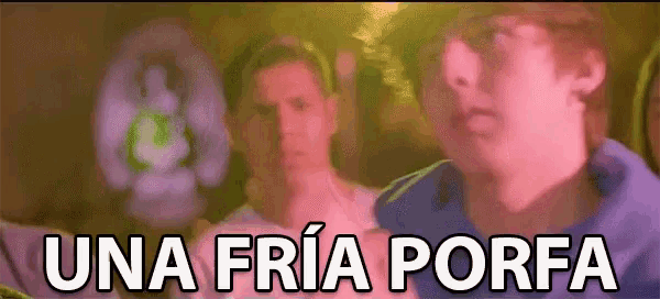 a man is standing in front of a sign that says una fria porfa