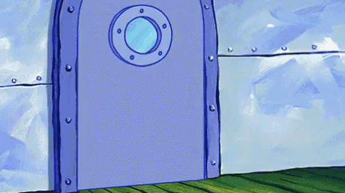 a blue door with a round window in the middle of it