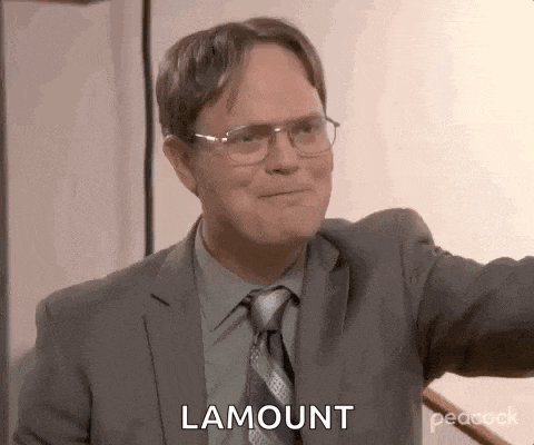 dwight schrute is wearing glasses and a suit and tie and says lamount .