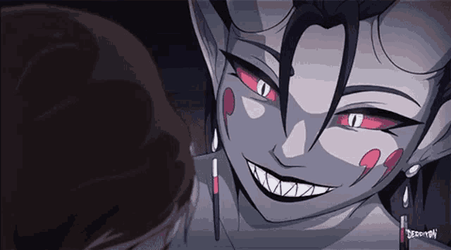 a close up of a cartoon character with red eyes and teeth .