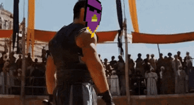 a man with a pixelated face is standing in front of a crowd of people .