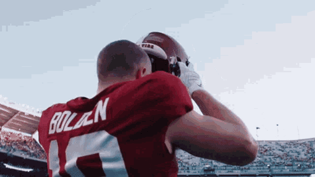a football player wearing a number 11 jersey