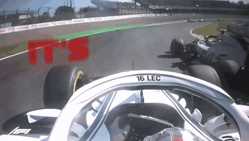 a racing car with the number 16 lec on the steering wheel