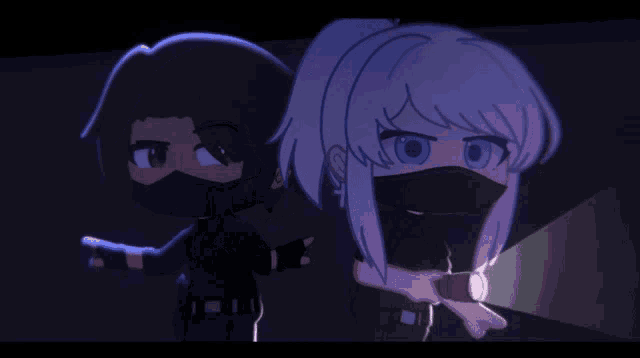 a man and a woman are standing next to each other in a dark room