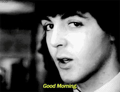 a close up of a man 's face with the words " good morning " next to him