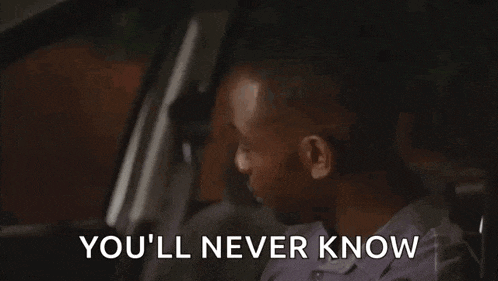 a man sitting in a car with the words you 'll never know above him
