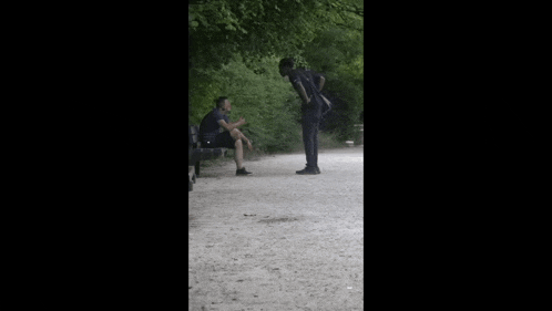 a man standing next to another man on a dirt road with the words you do n't have the time please the time