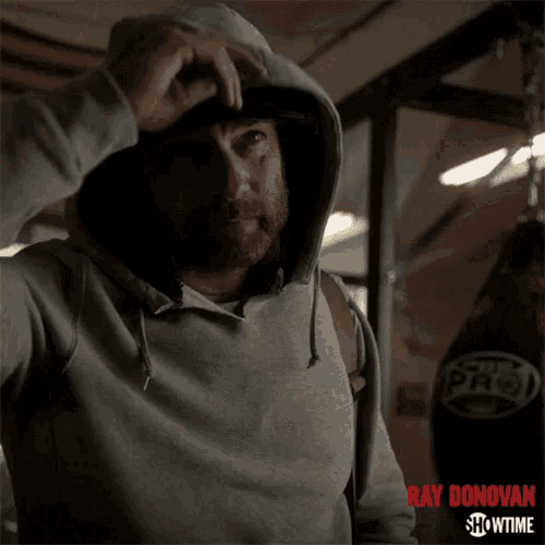 a showtime ad for ray donovan shows a man wearing a hat with the letter b on it