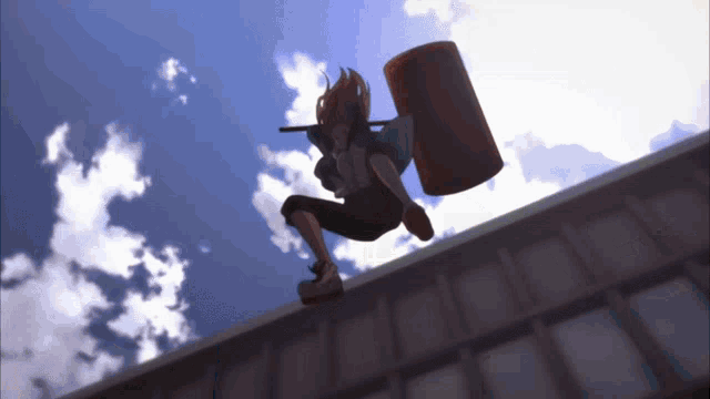 a person is jumping off a building while holding a large barrel