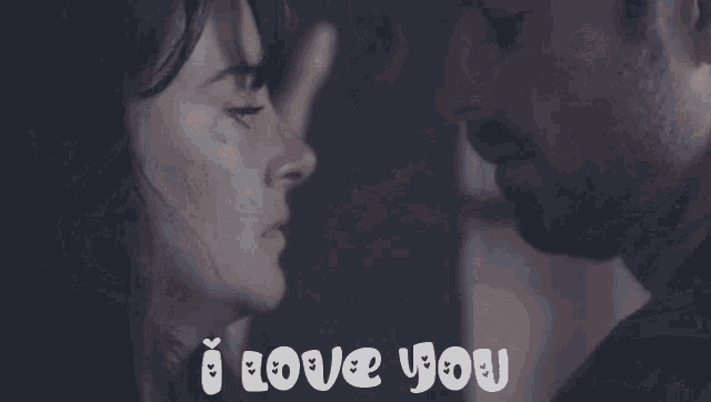 a picture of a man and woman kissing with the words i love you behind them