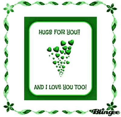a green greeting card that says hugs for you