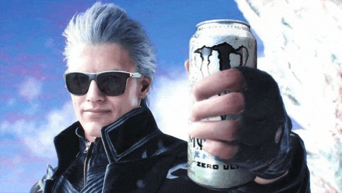 a man wearing sunglasses is holding a can of energy drink .