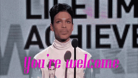 prince is standing in front of a microphone with the words you 're welcome behind him