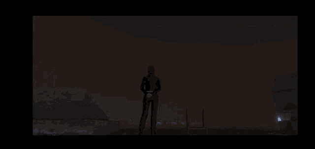 a silhouette of a person standing in front of a lightning bolt in the sky